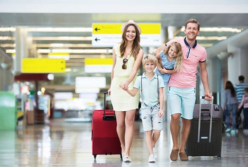 Family with luggage at the airport